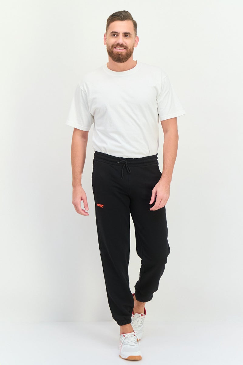 PUMA Men Sportswear Fit Brand Logo Training Sweatpants, Black  - Image 3