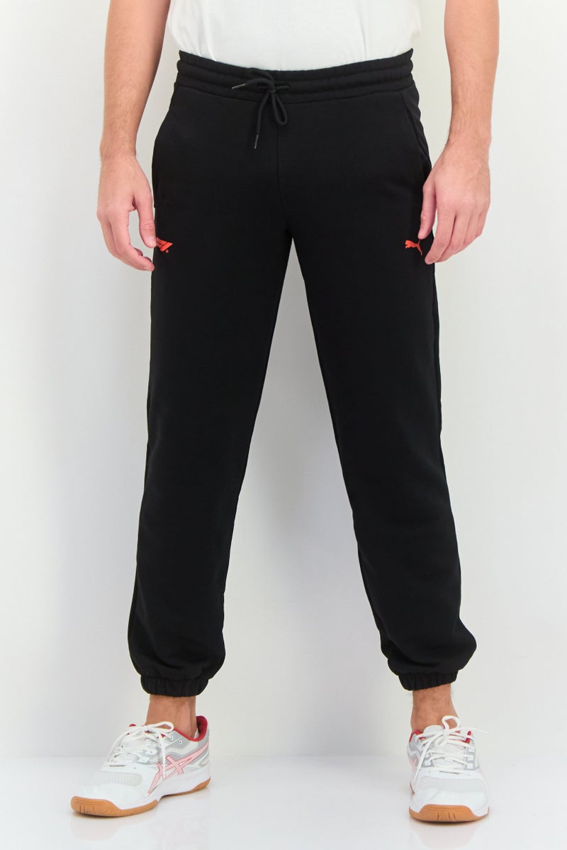 PUMA Men Sportswear Fit Brand Logo Training Sweatpants, Black  - Image 1