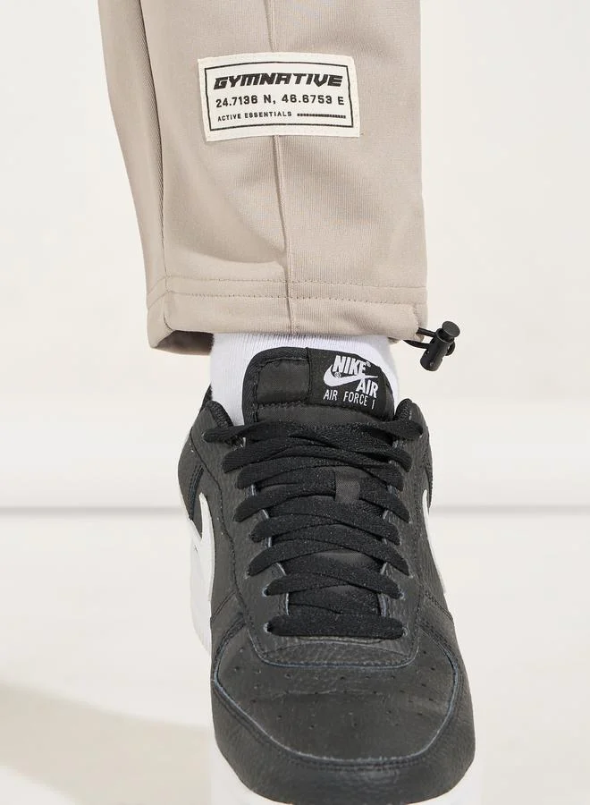 Styli Ultra Soft Slim Pintuck Athleisure Joggers with Badge Detail