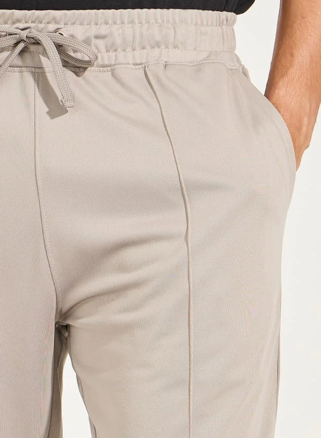 Styli Ultra Soft Slim Pintuck Athleisure Joggers with Badge Detail