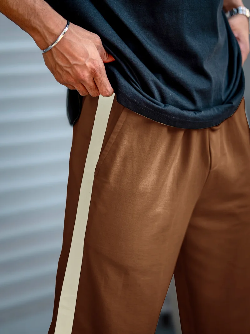 مانياك بنطال رياضي رجالي مانياك بلون بني وكريمي محبوك بحلقات