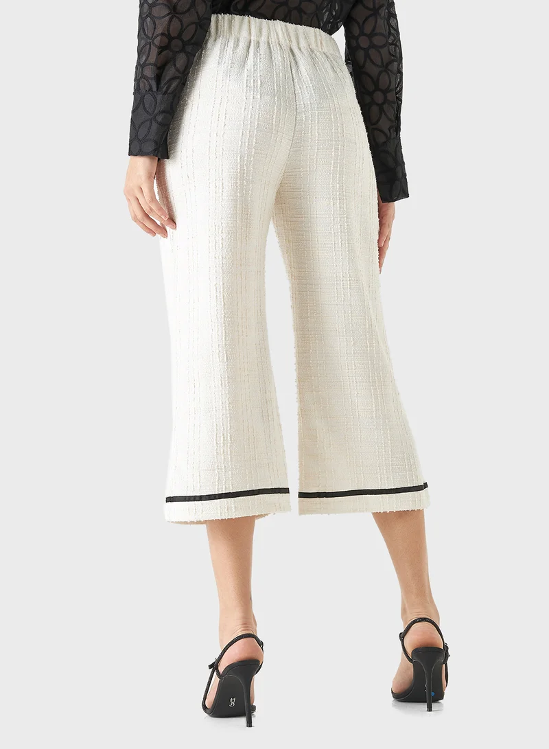 Iconic Textured Tweed Flared Pants with Tape Detail and E