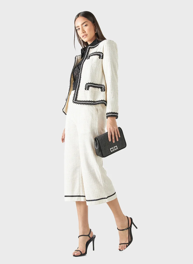 Iconic Textured Tweed Flared Pants with Tape Detail and E