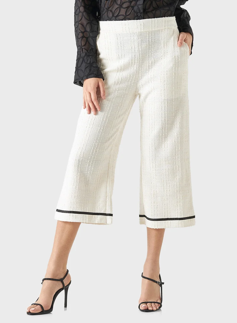 Iconic Textured Tweed Flared Pants with Tape Detail and E