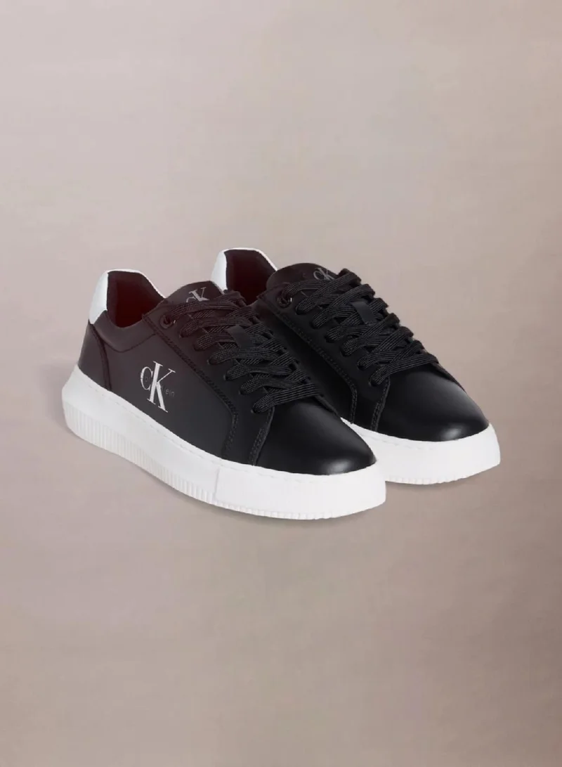 Calvin Klein Black/Bright White Leather Trainers for Women | Best Price UAE