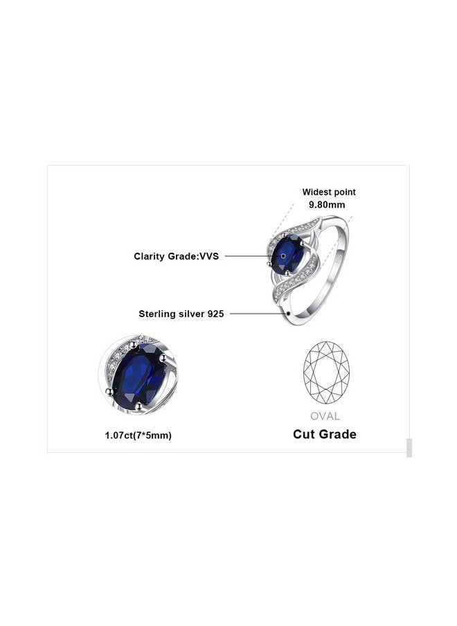 جوليري بالاس - خواتم من الياقوت الأزرق البيضاوي عيار 1 قيراط من JewelryPalace للنساء، خاتم مطلي بالذهب الأبيض عيار 14 قيراطًا من الفضة الإسترلينية عيار 925 للنساء، مجموعات مجوهرات من الأحجار الكريمة، خواتم وعد مقاس 6.5 - Image 1