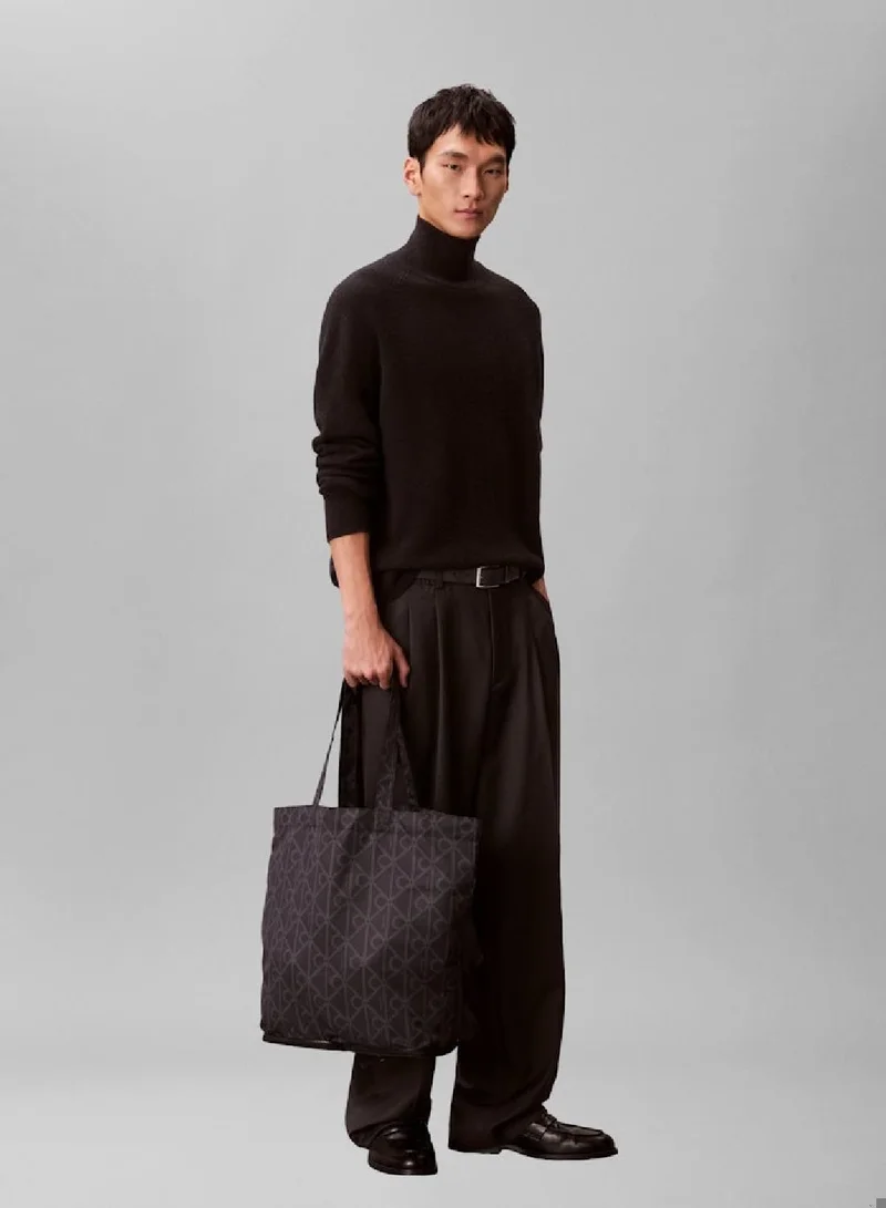 Calvin Klein Jeans Pirate Black Printed Monogram Tote Bag for Men | Best Price UAE