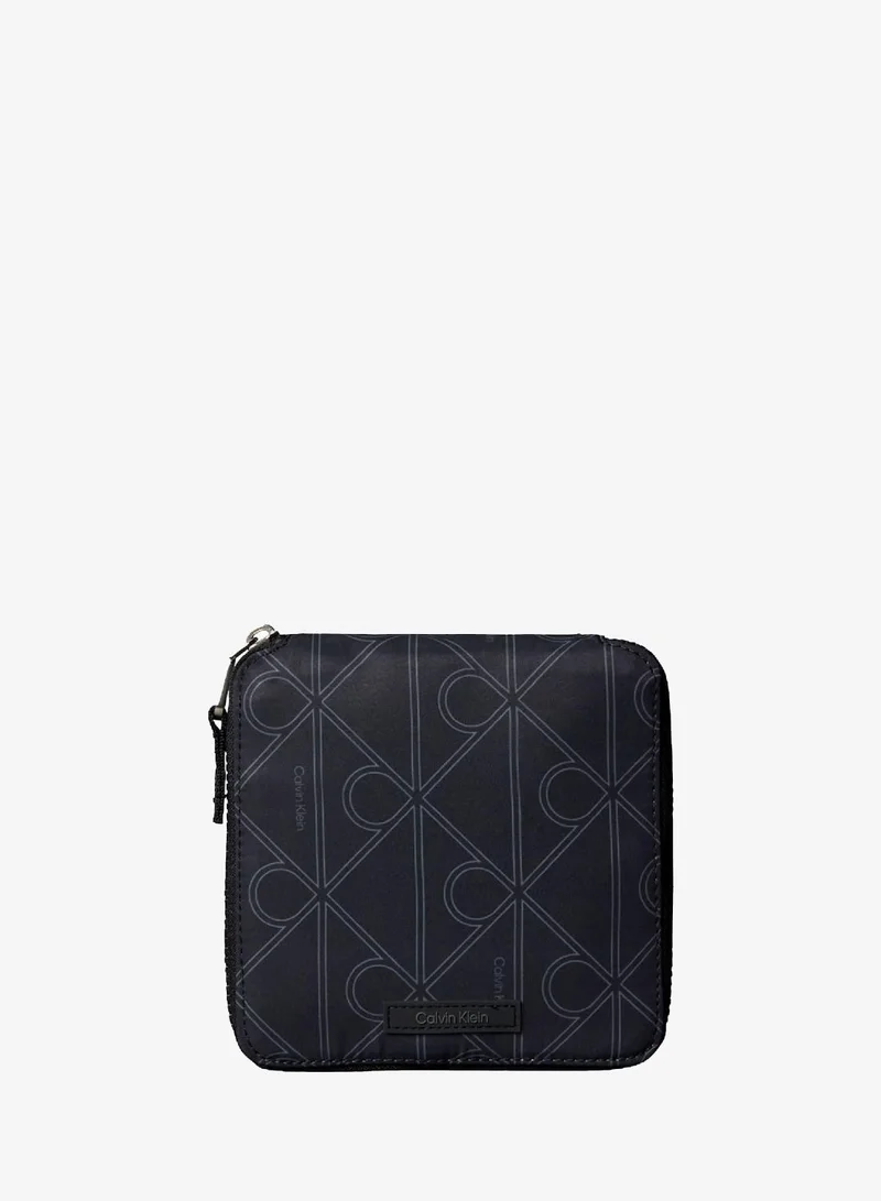 Calvin Klein Jeans Pirate Black Printed Monogram Tote Bag for Men | Best Price UAE