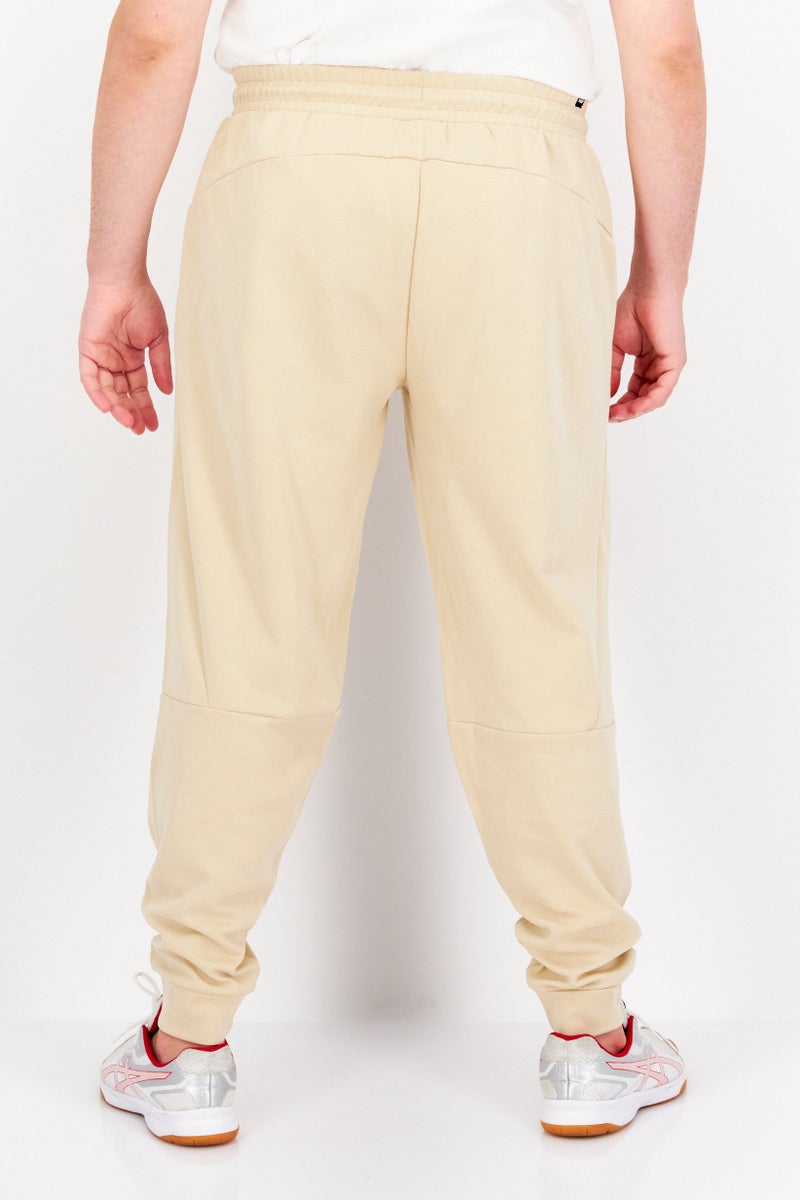 PUMA Men Sportswear Fit Training Pants, Beige - Image 3
