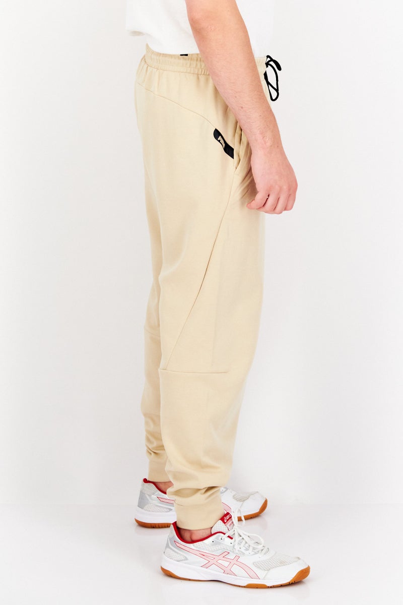 PUMA سروال تدريب رياضي للرجال، بيج - Image 2