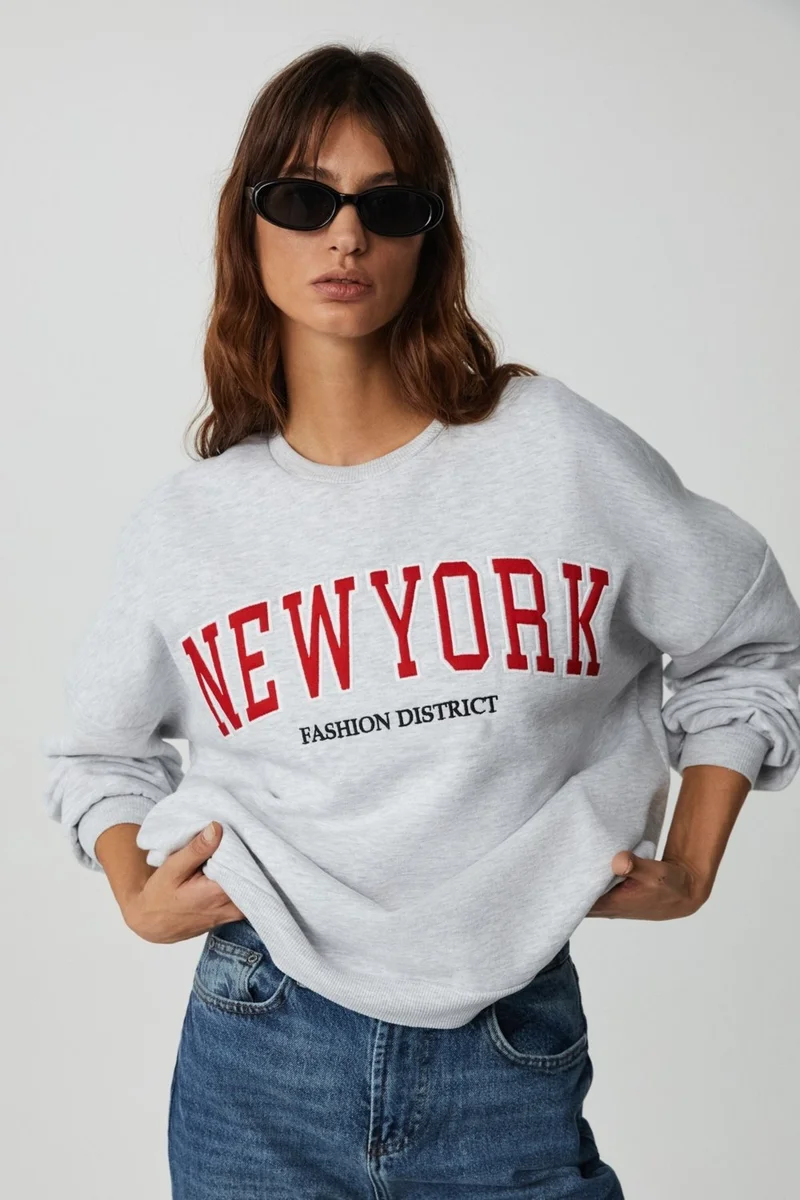 GRIMELANGE Jordan Women's Long Sleeve Round Neck Front Applique Embroidered Off Shoulder Oversize Sweatshirt