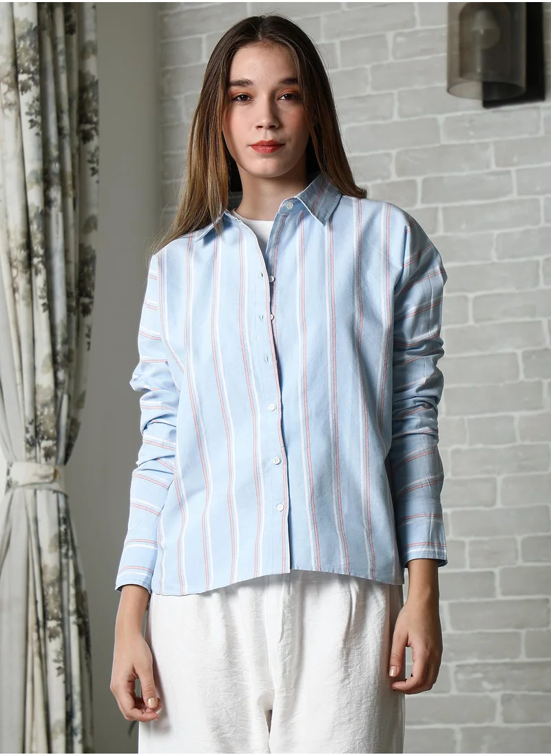Campus Sutra Women's Baby Blue Striped Oversized Shirt For Casual Wear | Spread Collar | Long Cuffed Sleeves | Button Closure | Oversized Shirt Crafted With Comfort Fit For Everyday Wear