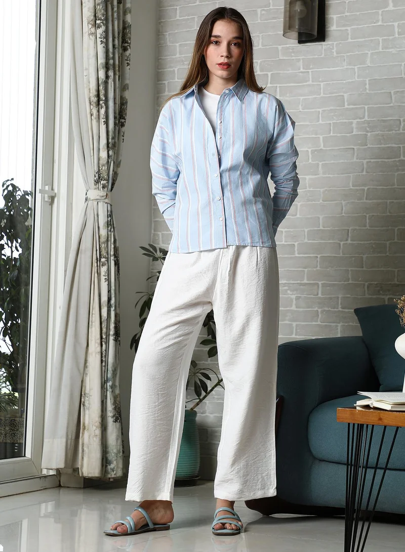 Campus Sutra Women's Baby Blue Striped Oversized Shirt For Casual Wear | Spread Collar | Long Cuffed Sleeves | Button Closure | Oversized Shirt Crafted With Comfort Fit For Everyday Wear