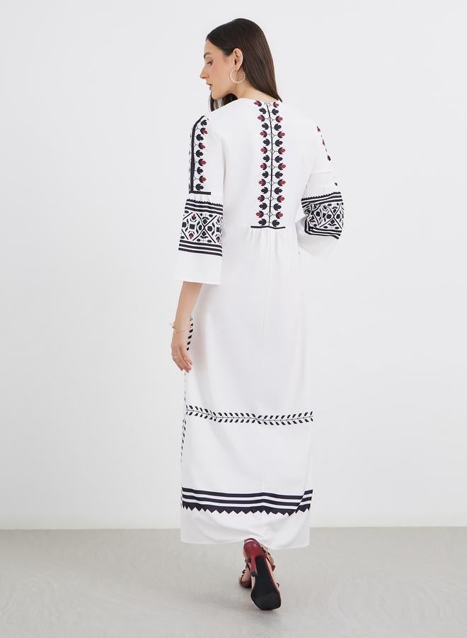 ستايلي فستان ماكسي بتصميم خطوط مطبوعة وأكمام ثلاثة أرباع - Image 5