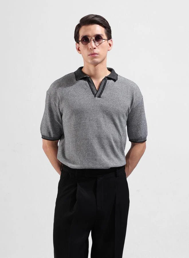 شركة المرآب الهندية Men Oversized Fit Textured Polo Neck Half Sleeves T-Shirt