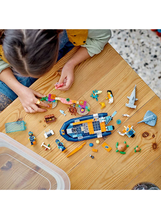 ليغو City Explorer Diving Boat 60377 Building Toy Set; Ocean Playset for Ages 5+; Includes a Coral Reef Setting, Mini-Submarine, 3 Minifigures and Manta Ray, Shark, Crab, 2 Fish and 2 Turtle Figures (182 Pieces)