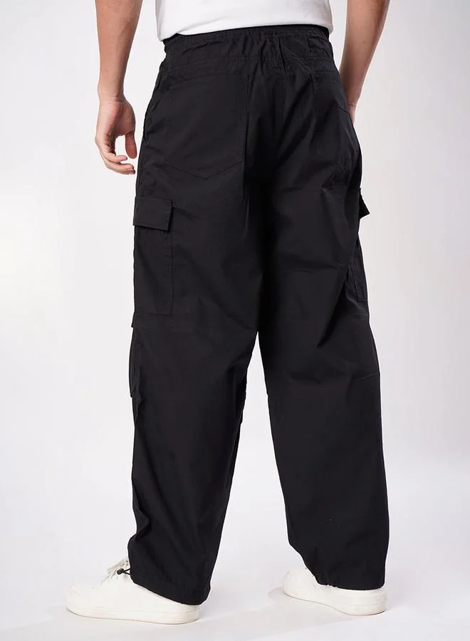ستايلي Men Black Parachute Fit Cargo Trousers By Bene Kleed