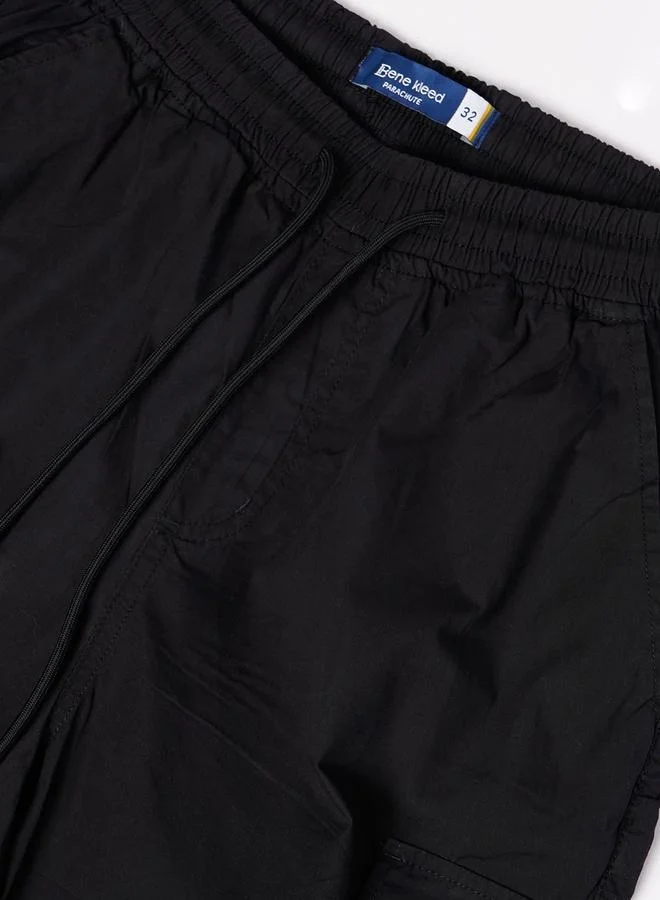 ستايلي Men Black Parachute Fit Cargo Trousers By Bene Kleed
