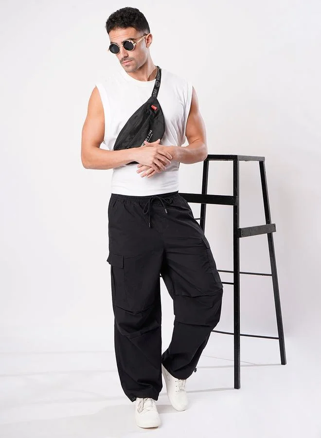 ستايلي Men Black Parachute Fit Cargo Trousers By Bene Kleed
