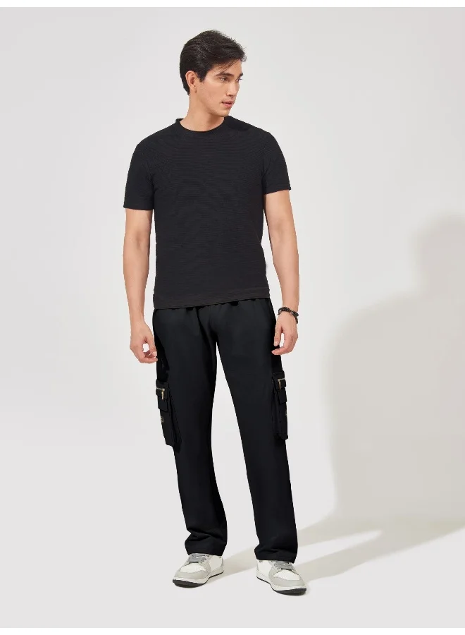 Maniac  Maniac Mens Solid Black Oversized Cotton Cargo Pant for Men | Best Price UAE