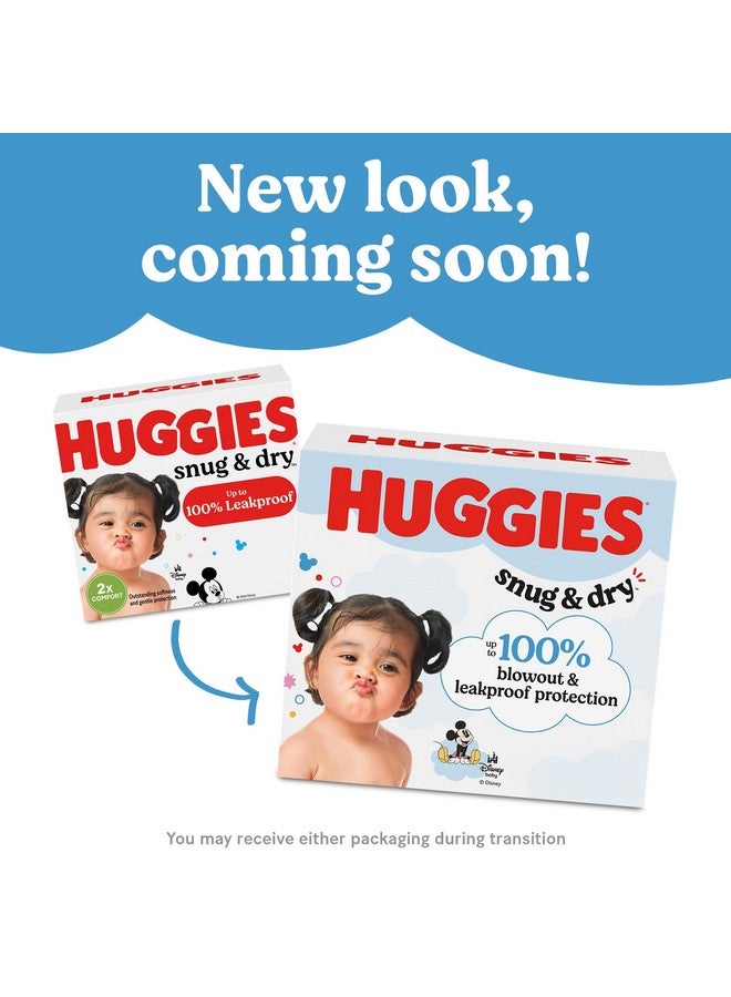 Huggies Size 4 Diapers, Snug & Dry Baby Diapers, Size 4 (22-37 lbs), 27 Count, Packaging May Vary - Image 2