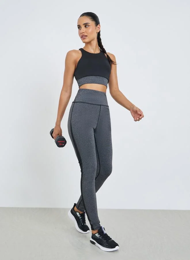 Styli Active Color Block Open Back Sports Bra and Leggings Set
