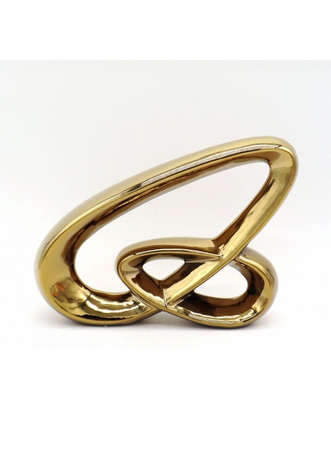 DANUBE HOME Danube Home Inaaya Knot Gold Accent Figurine - 30X5.5X22.5 Cm Elegant Stoneware Titanium Gold Finish Room Decor Collection Decorative Home Accessories 