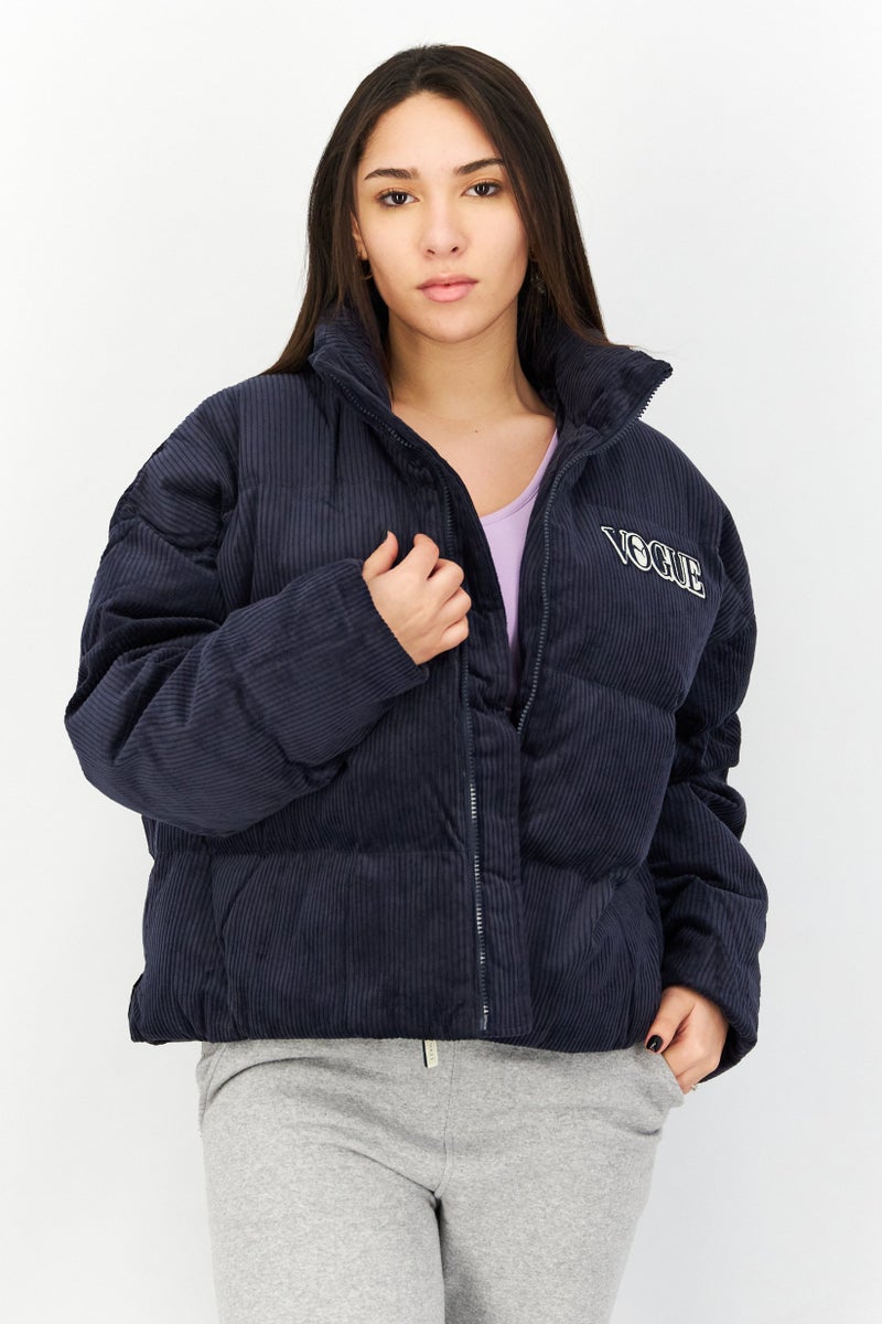 PUMA Puma x Vogue Women Oversized Fit Long Sleeve Training Puffer Jacket, Navy - Image 1