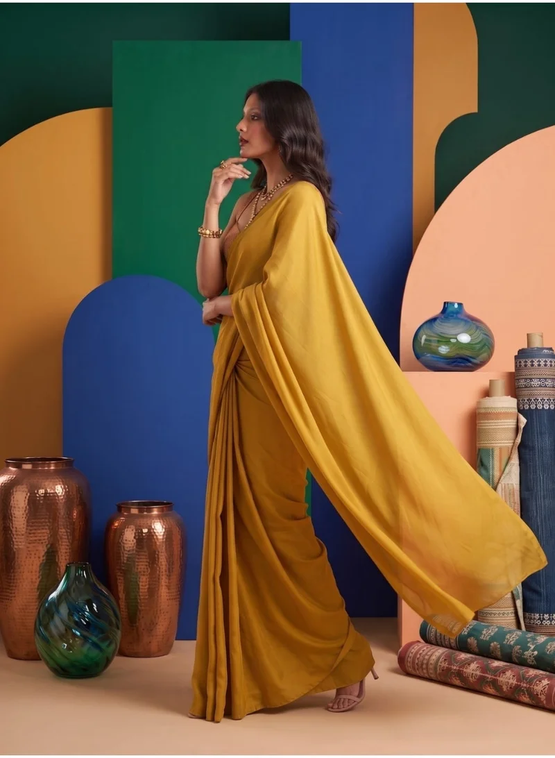 Nool  Saffron Solid Chiffon Saree with Complimentary Handpicked Blouse Material for Women | Best Price UAE