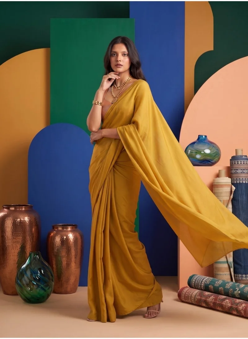 Nool Saffron Solid Chiffon Saree with Complimentary Handpicked Blouse Material