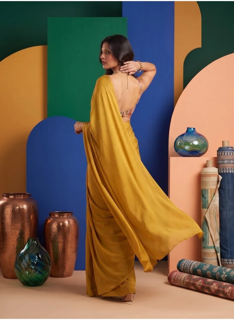 Nool  Saffron Solid Chiffon Saree with Complimentary Handpicked Blouse Material for Women | Best Price UAE