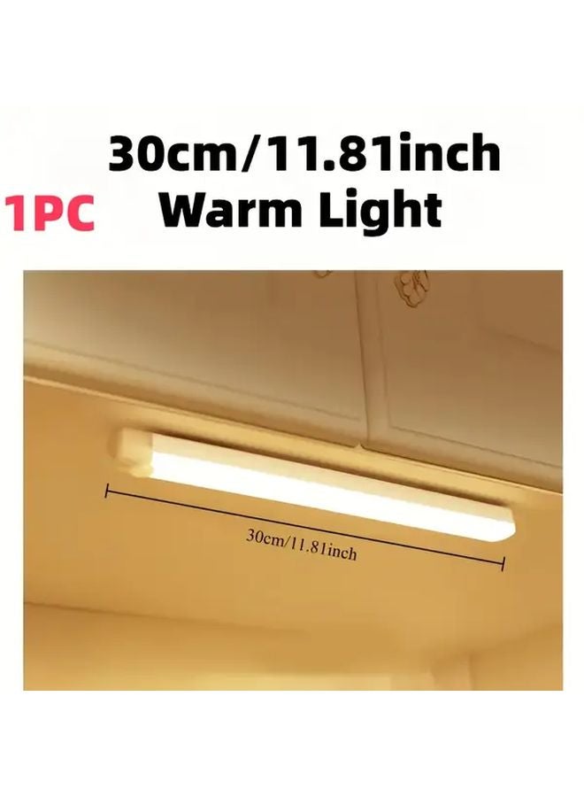 شريط LED محمول مع مستشعر حركة 30 سم، ضوء أبيض دافئ، شحن عبر USB، قابل للتركيب المغناطيسي - Image 1