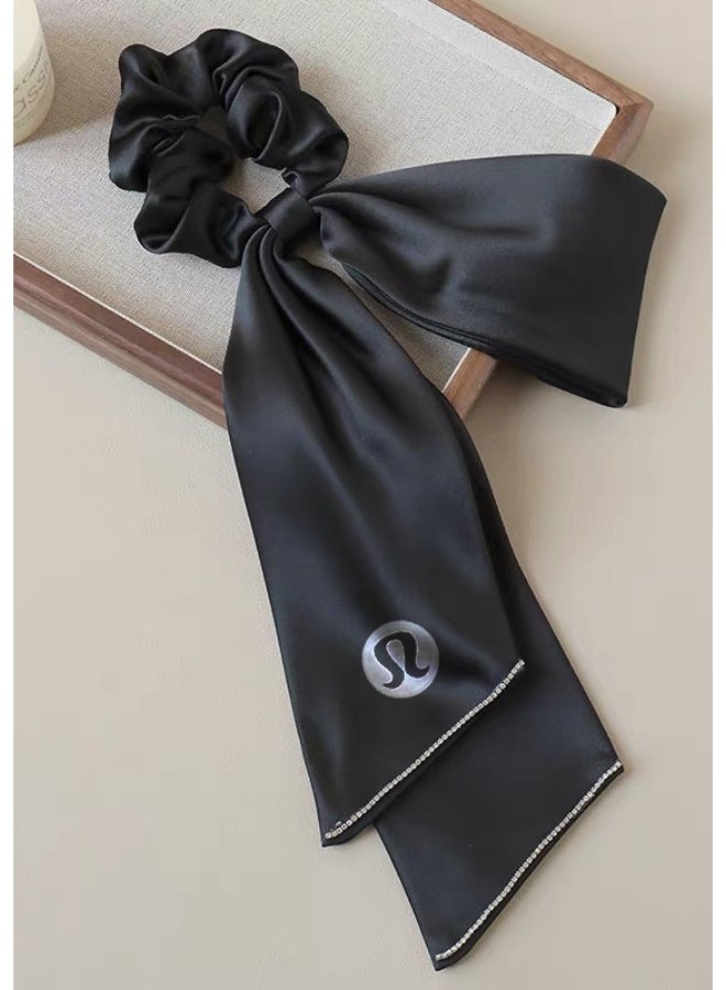 Lululemon Black Satin Scrunchie Scarf - Luxury Silk Hair Tie with Bow Detail & Brand Logo for Styling & Hair Care - Image 1