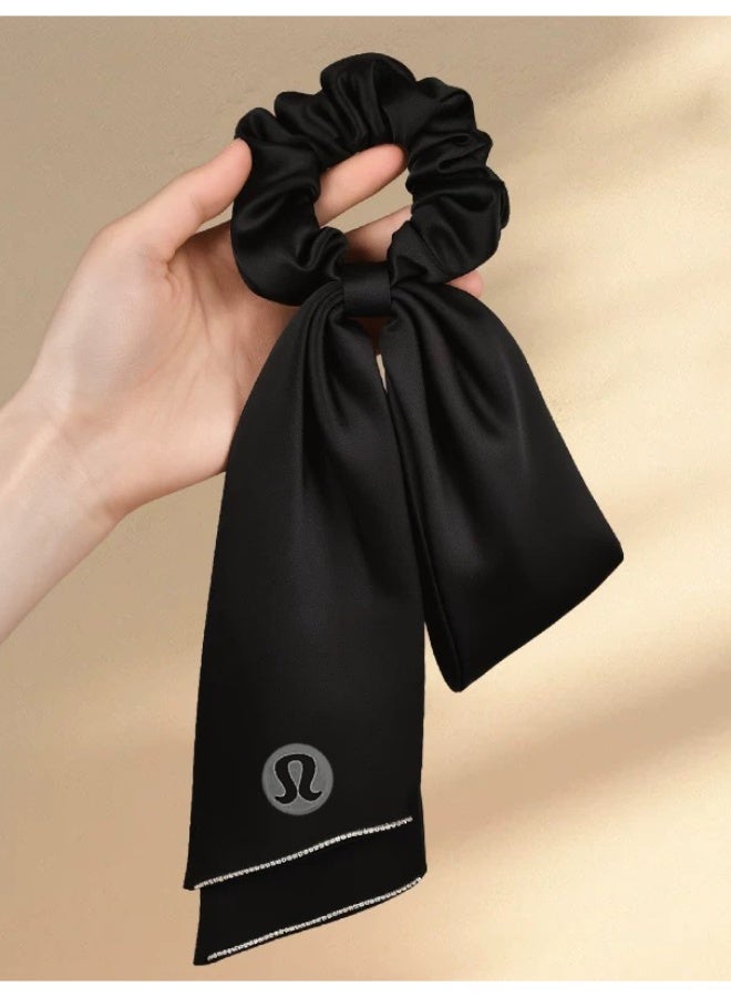 Lululemon Black Satin Scrunchie Scarf - Luxury Silk Hair Tie with Bow Detail & Brand Logo for Styling & Hair Care - Image 3