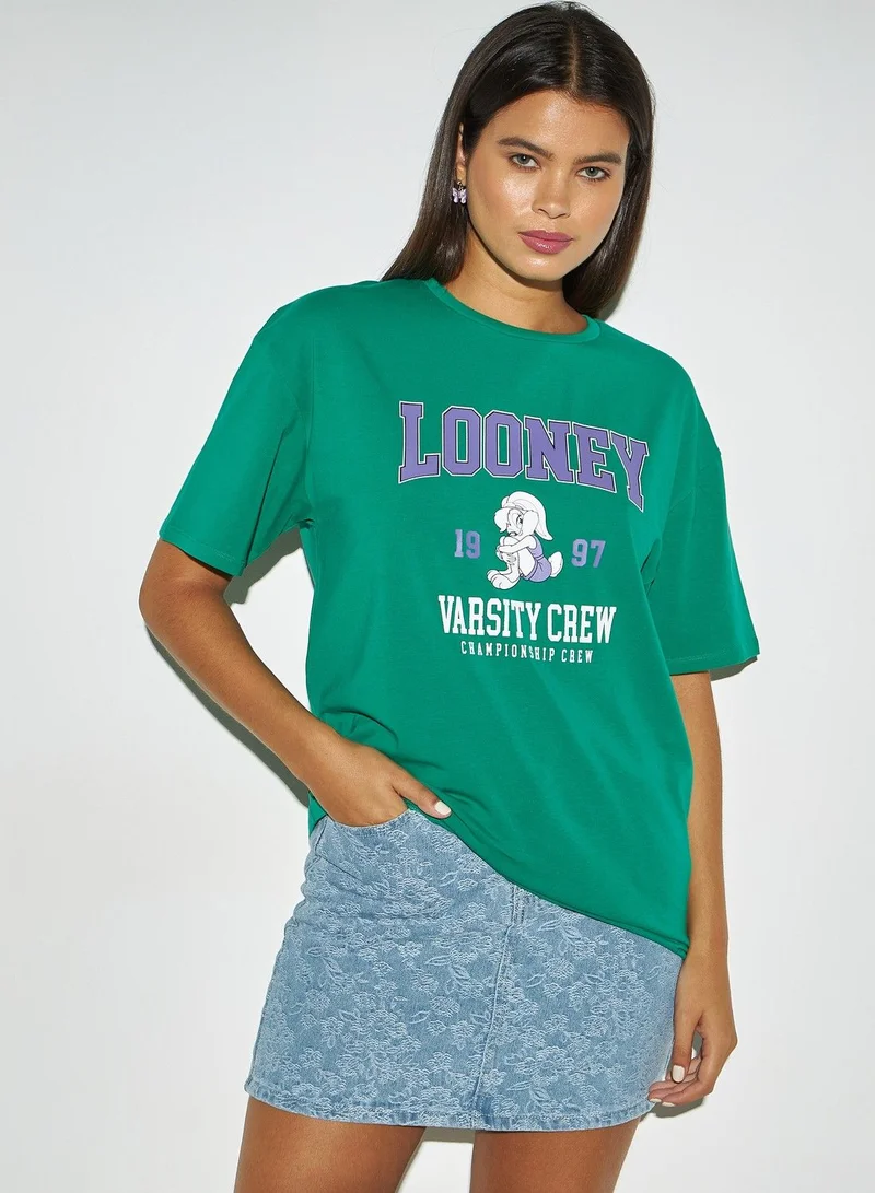 SP Characters Looney Tunes Print Longline T-shirt with Crew Neck and Drop Shoulder Sleeves