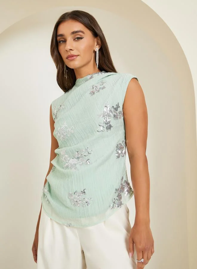 ستايلي بلوزة بلا أكمام مزينة بالترتر