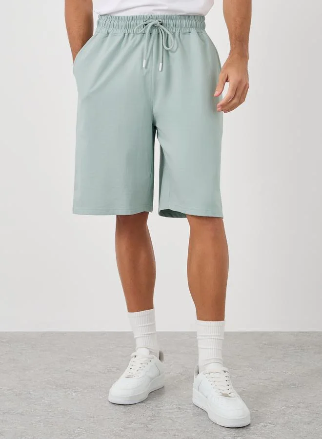 Styli Styli Solid Oversized Shorts with Drawstring