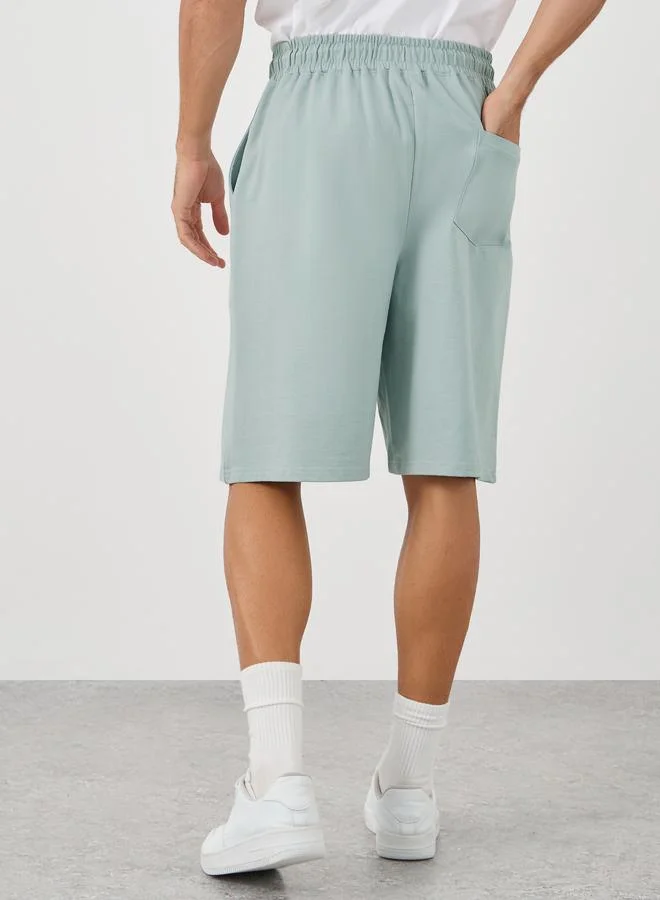 Styli Styli Solid Oversized Shorts with Drawstring