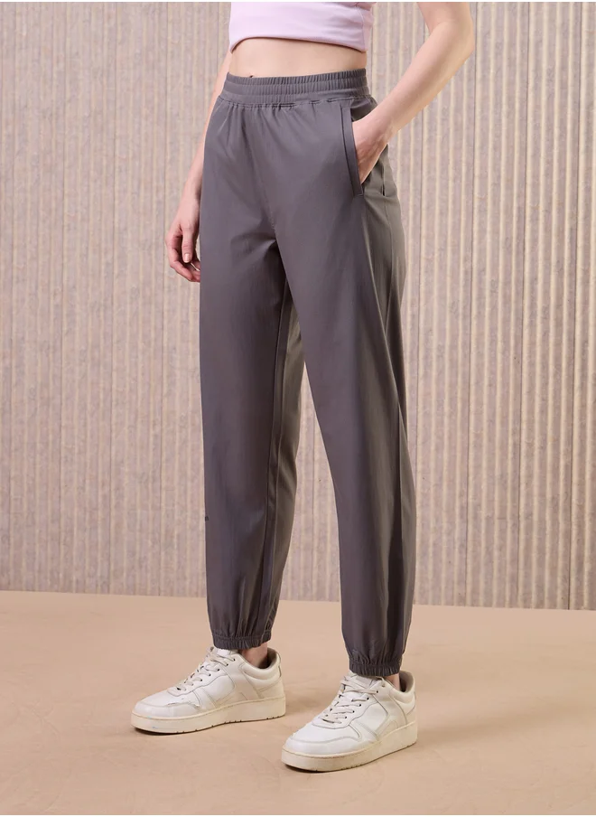 تكنوسبورت Women Grey Solid 2-Way Stretch Joggers