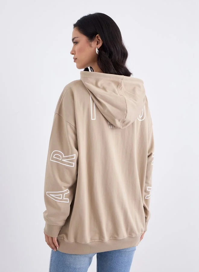 Styli  Styli Tan Graphic Print Longline Oversized Hoodie for Women | Best Price UAE