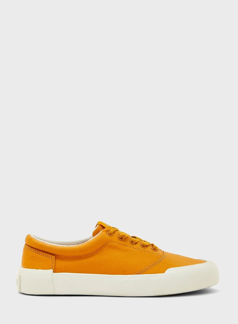 TOMS Lace Up Low Top Sneakers