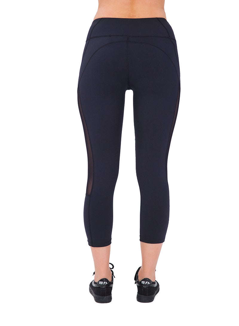 Sharpdo Women's Mid Waist Side Mesh Dry Fit Workout Capri Leggings with Inner Pocket - Image 4