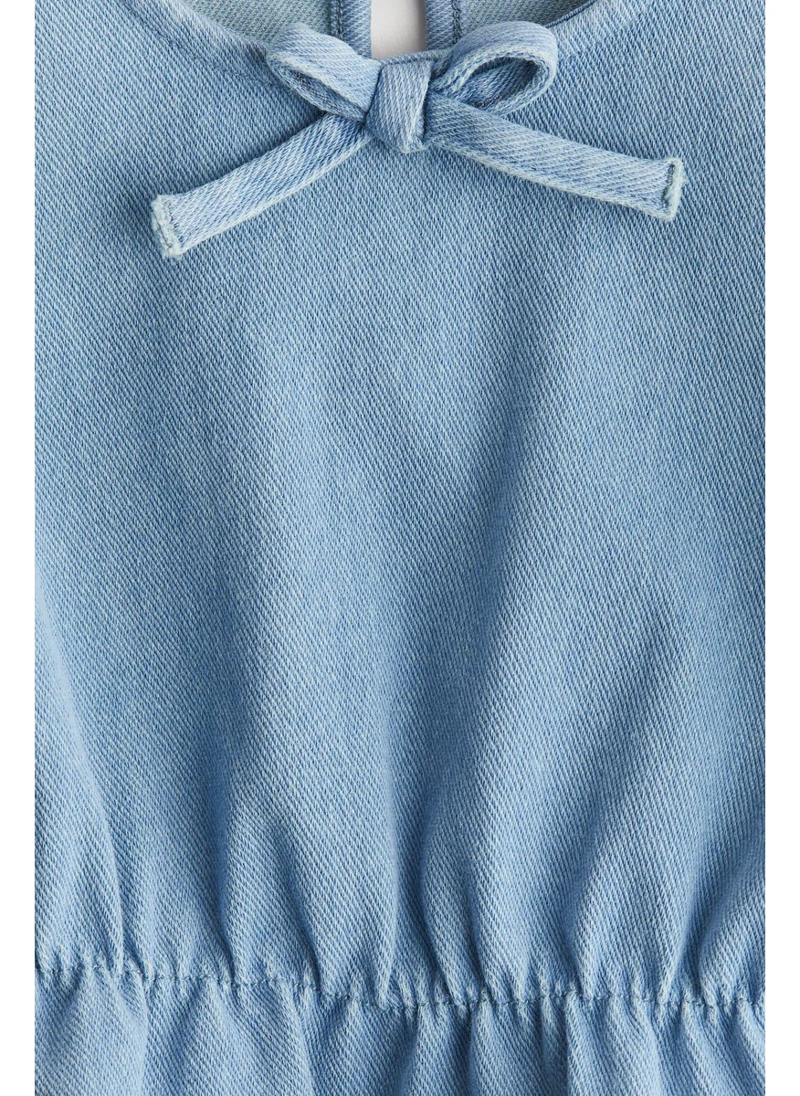 H&M Denim-Look Peplum Top