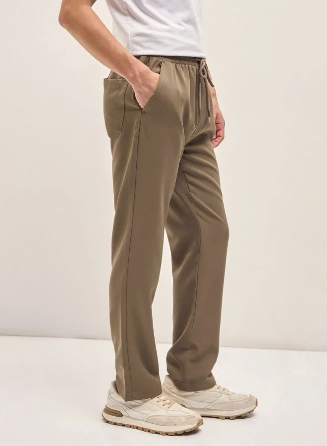 THE BEAR HOUSE Men's Beige Classic Korean-Inspired Elastic Waist Casual Trouser Versatile Office and Travel Pants Comfortable Fit for Everyday Use Easy to Style Bottomwear for Work Weekend and Outings