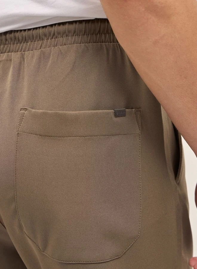 THE BEAR HOUSE Men's Beige Classic Korean-Inspired Elastic Waist Casual Trouser Versatile Office and Travel Pants Comfortable Fit for Everyday Use Easy to Style Bottomwear for Work Weekend and Outings