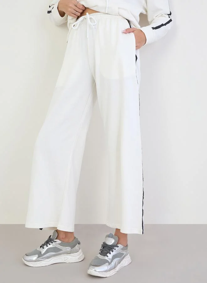 Styli  Styli Off White Printed Longline Hoodie and Joggers Co-Ords for Women | Best Price UAE