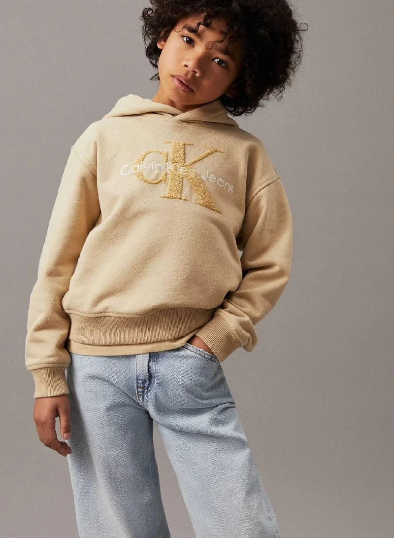 كالفن كلاين جينز هودي بقصة مريحة من قماش تيري مزين بشعار كلفن كلاين