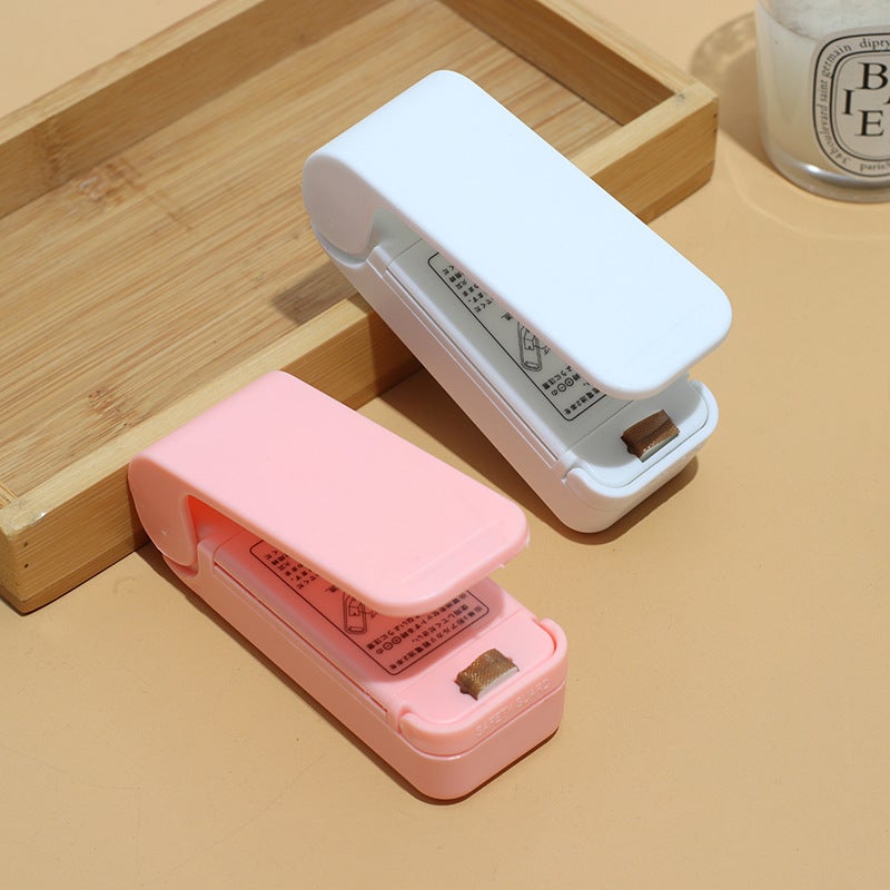 Mini Sealing Machine, Small Household Plastic Sealing Machine, Snack Sealing Artifact, Portable Moisture-Proof Hand-Pressed Plastic Bag Sealing Machine - Image 2