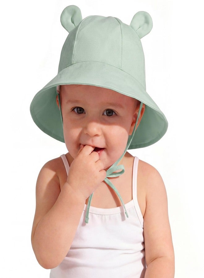 زاندو قبعة شمسية للأطفال من زاندو بحافة عريضة، مقاس 6-12 شهرًا - قبعة شمسية للأطفال الرضع من عمر 6-12 شهرًا مزودة بأذني دب للحماية من الأشعة فوق البنفسجية، مناسبة للسباحة والشاطئ في الصيف، قبعة دلو للأطفال من الجنسين، قابلة للتعديل للاستخدام اليومي في الهواء الطلق، هدية مثالية للحفلات، لون أخضر، مقاس صغير - Image 1