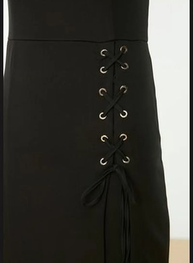 trendyol Knitted Black Midi Dress with Eyelets and a Slit TWOSS19EL0079